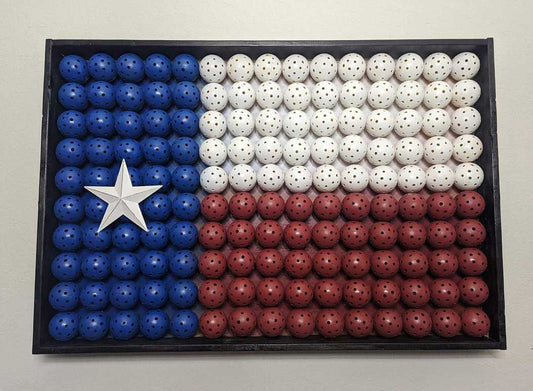 photo of old pickleballs repurposed to USA flag